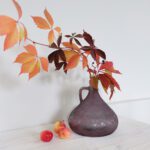 Rustiikkinen pullo maljakko