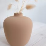 Beige keraaminen maljakko