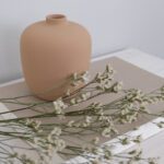 Beige keraaminen maljakko